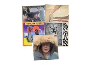 Assorted Vinyl Records Including Santana, Paul Simon, And Jefferson Starship, Etc.