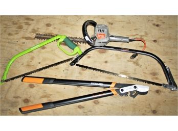 Lot Of Tree Trimming Tools With Black & Decker Hedge Trimmers, Gardenline & Fiskars Bow Saws & Fiskars Loplers
