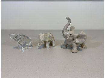 Group Of Three Elephants Of Different Materials