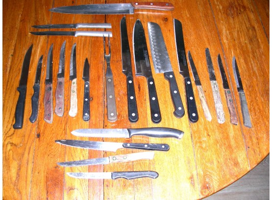 Twenty One Knives And A Serving Fork