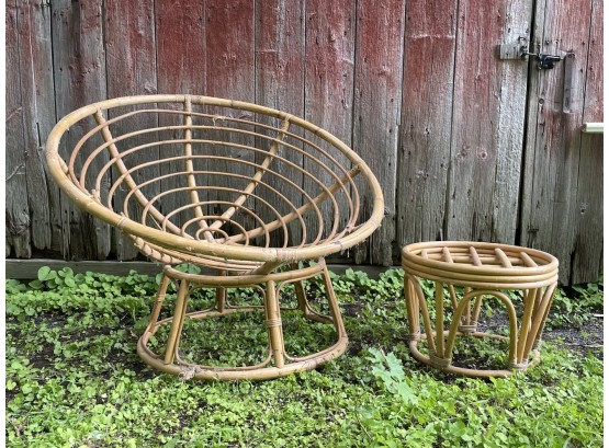 A Rattan Papasan Chair And Ottoman By Crate & Barrel