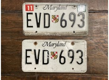 A Pair Of Vintage License Plates