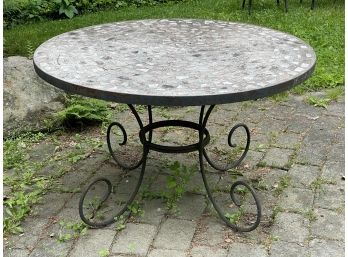 A Vintage Wrought Iron Table With Pique Assiette Mosaic Top