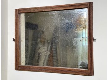 An Antique Oak Eastlake Style Mirror