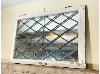 A Gorgeous Leaded Glass Window Over Mirror