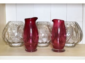 Cranberry Glass Pitchers And Crystal Candle Holders