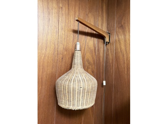 A Fabulous Mid Century Wall Hanging Fixture With Wicker Shade