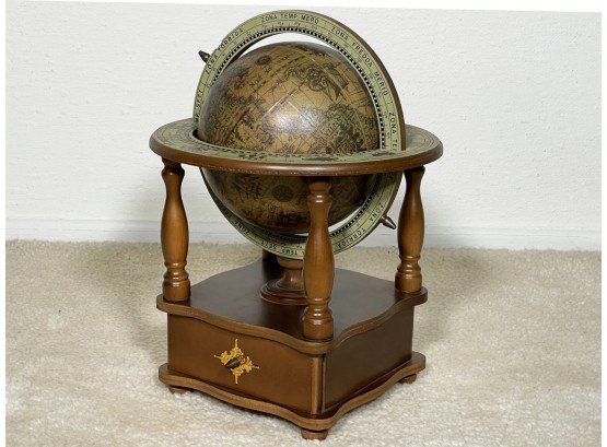 A Miniature Decorative Globe
