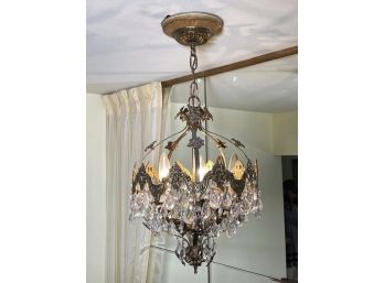 A Fabulous Bronze And Crystal Chandelier