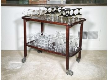 A Vintage Mid Century Bar Cart And Glassware