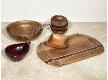 An Assortment Of Carved Wood Kitchen Items