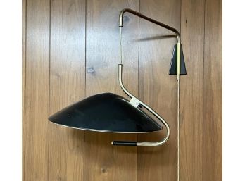 An Enamel And Brass Mid Century Adjustable Height Wall Sconce