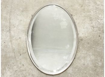 A Vintage Chrome Framed Beveled Mirror