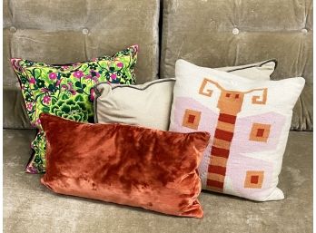 An Assortment Of Designer Throw Pillows