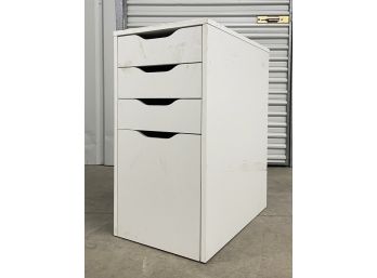 A Modern Painted Wood Drawer Unit