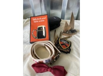 A Collection Of Items Bow Tie, Brass Ship, New Hankercheifs, Belt And More