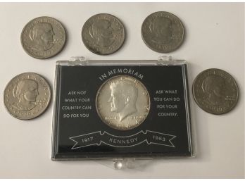 1964 Kennedy In Sealed Holder And (5) 1979 Susan B Anthony Dollar Coins