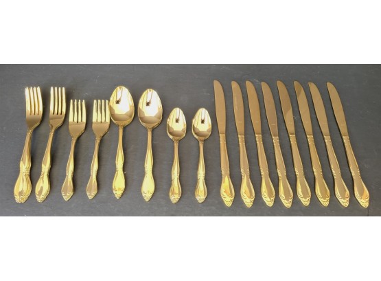 Never Used Forty Piece Custom Craft Gold Plated Made In Japan Stainless Steel Flatware Set