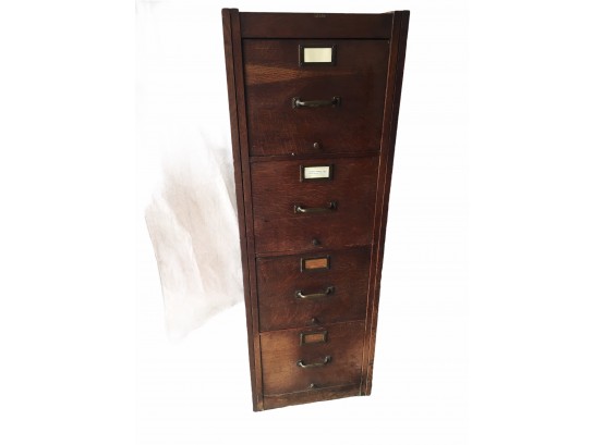 Vintage Globe Oak 4 Drawer Filing Cabinet.