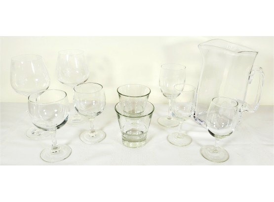 Set Of Glassware Including Wine Glasses And Pitcher