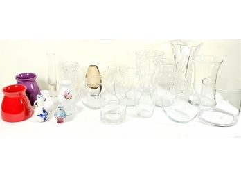 Assorted Vases Of Many Shapes, Colors, And Materials