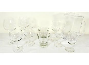 Set Of Glassware Including Wine Glasses And Pitcher