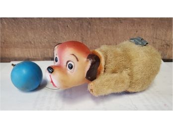 Vintage Wind Up Toy Dog Chasing His Blue Ball. It Walks Forwards & Back. Soft Rubber Head Moves Side To Side