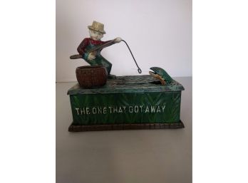 The One That Got Away, Cast Iron Mechanical Coin Bank Reproduction.