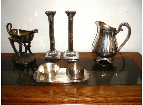 Silverplate Lot: Candlesticks, Oneida Pitcher, Gravy On Stand, And More