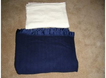 Two Blankets: White Cotton And Blue Acrylic