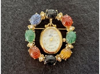 Vintage Faberge Brooch With Hanging Pendant Watch Framed In Cabochon Stones