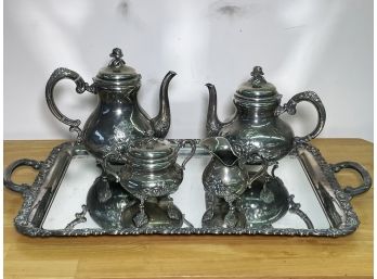 An Antique German Repousse Sterling Silver Tea And Coffee Service, Handgetrieben