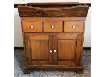 Country Cabinet With White Knobs Drawers And Cubby