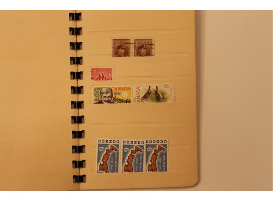 Book With Pages Of Canadian Stamps