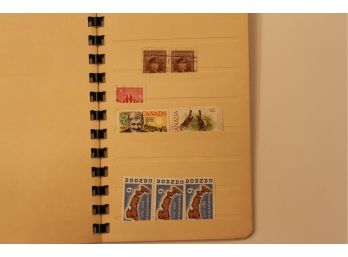 Book With Pages Of Canadian Stamps