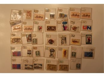 34 Stamps In Plastic 1700 Series