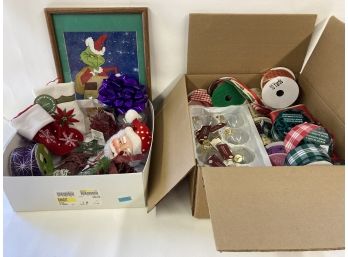 Two Boxes Of Christmas Ribbon And Ornaments And A Grinch Picture