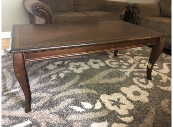 Ashley Furniture Mattie Cherry Stained Low Wood Coffee Table