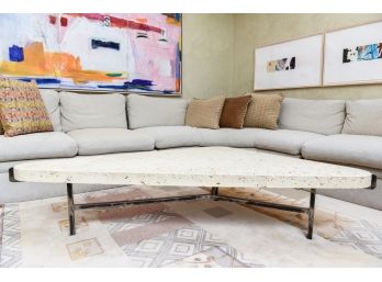 Geometric Shaped Fossil Top Coffee Table With Visible Fossil Indentations On Steel Base