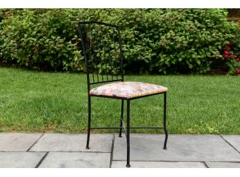 Wrought Iron Chair With Colorful Patterned Seat Cushion