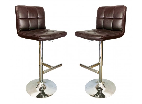 A Pair Of Modern Leather And Chrome Bar Stools