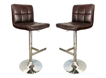 A Pair Of Modern Leather And Chrome Bar Stools