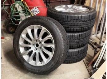 A Set Of Goodyear Tires, 255/55R20 And Rims
