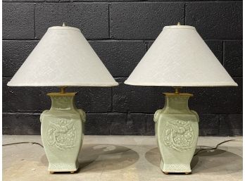 A Pair Of Ceramic Lamps With Linen Shades