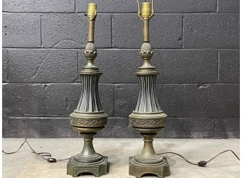 A Pair Of Decorative Bronze Tone Lamps