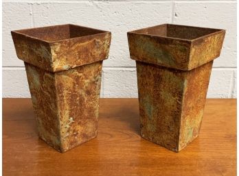 A Pair Of Cast Iron Planters