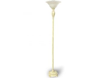 A Torchiere Lamp With Fluted, Frosted Glass Shade