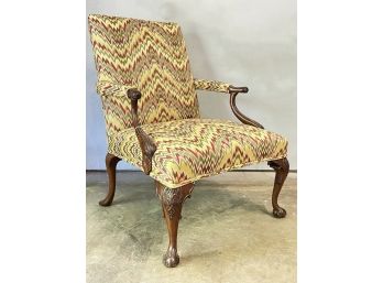 A Vintage Upholstered Chippendale Armchair