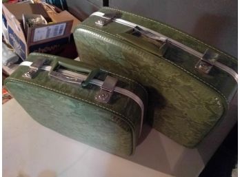 Pair Of Green Snakeskin Print Suitcases In Different Sizes