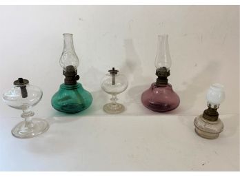 Group Of Oil Lamps Including Two Antique Twinkle Lamps